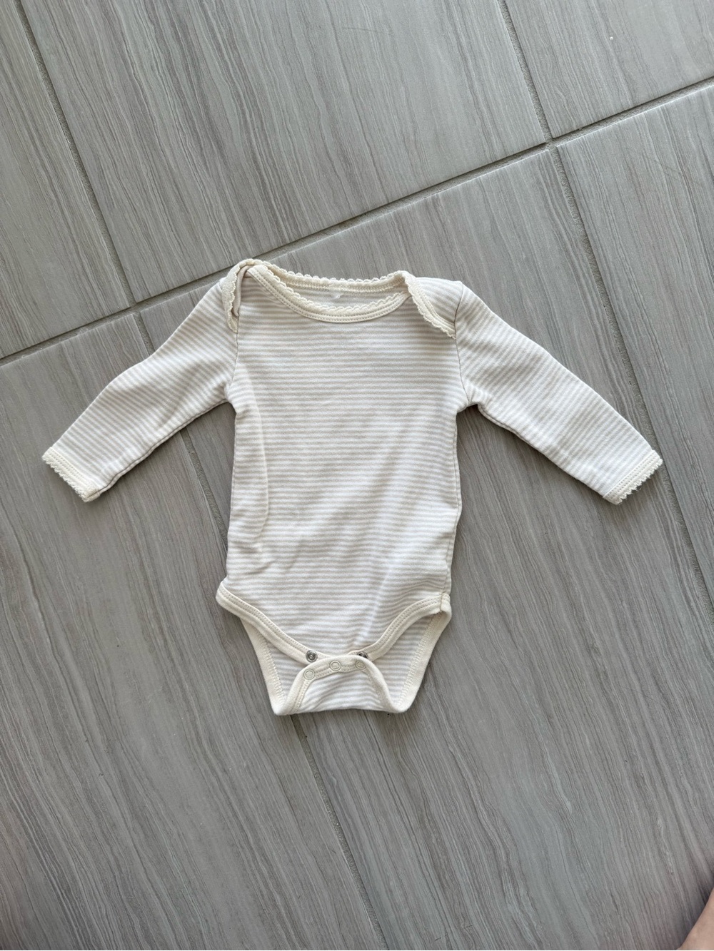 LUXE THREADS Classic Long-Sleeve Ribbed Baby One-Piece in Cream